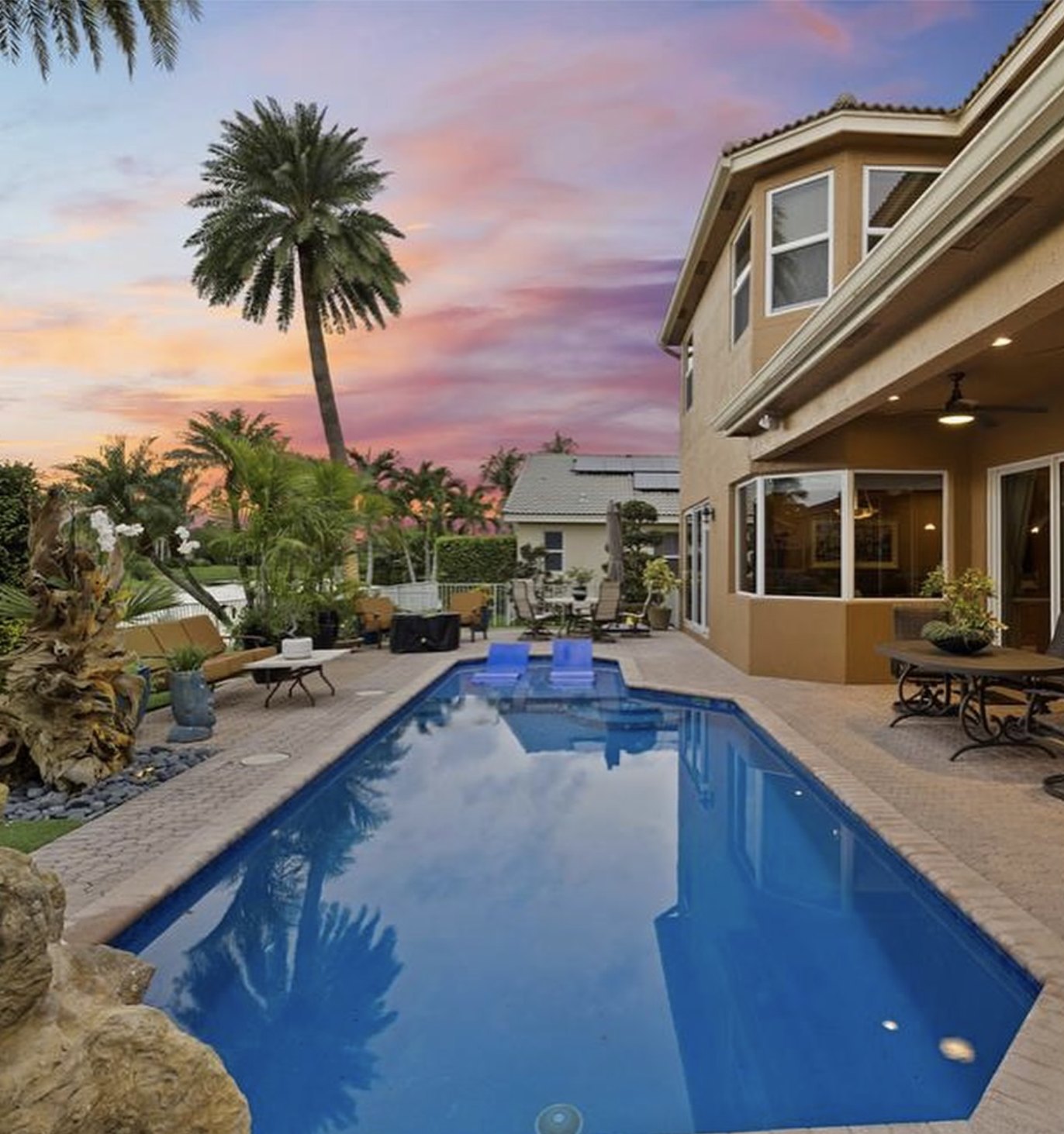 Resort pool at sunset